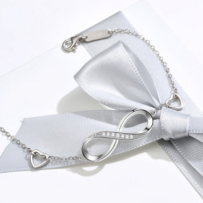 Éternelle™ | Bracelet Infini Serti de Cristaux et Cœurs Délicats