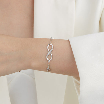 Éternelle™ | Bracelet Infini Serti de Cristaux et Cœurs Délicats
